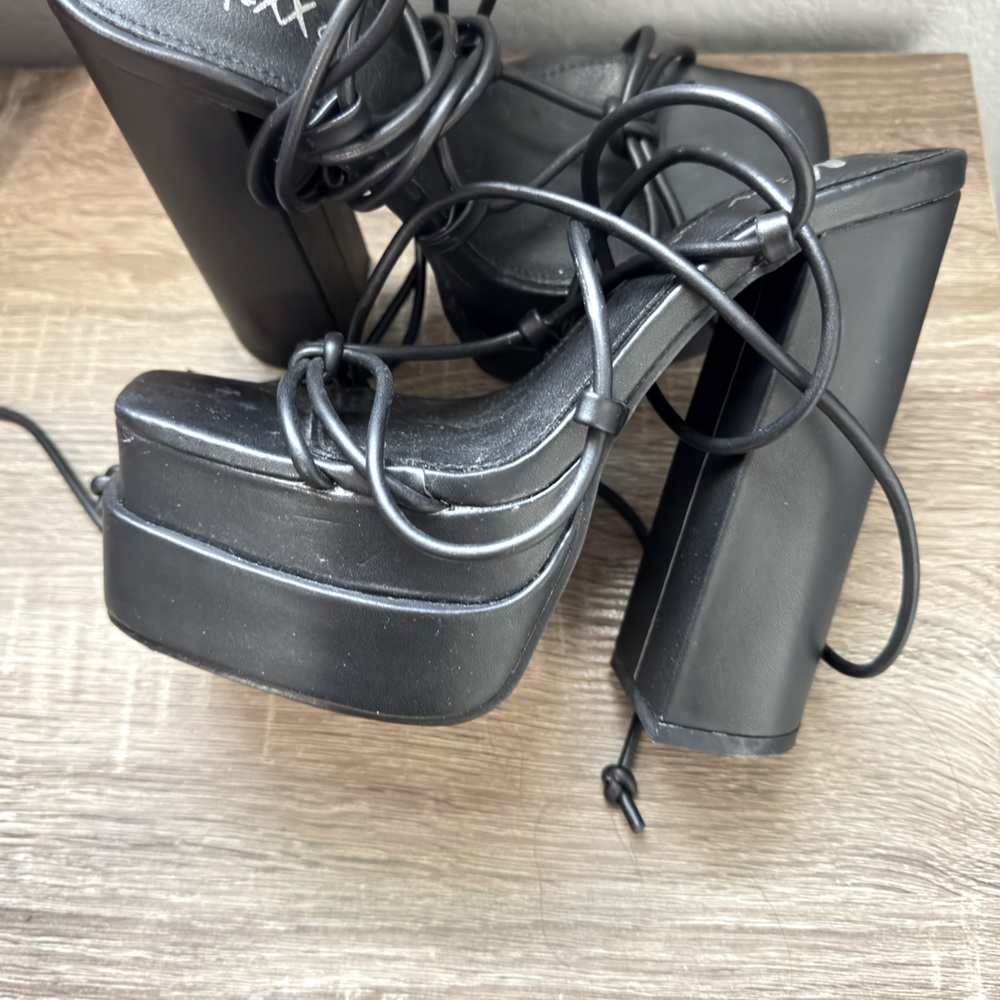 Brand new black platform heels size 6